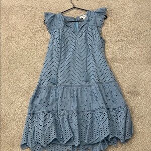 Blue eyelet dress.